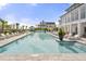 Large, resort-style pool lined with lounge chairs for relaxing at 7935 Flagship Ln, Johns Island, SC 29455