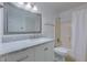 Bathroom featuring a marble vanity, chrome fixtures, and a shower with a curtain at 7945 Parklane Ct # C, North Charleston, SC 29418
