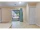 Bright dining room with sliding glass door, tile floors, and access to outdoor space at 7945 Parklane Ct # C, North Charleston, SC 29418
