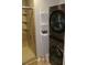 Convenient bathroom with washer and dryer adjacent to the modern shower and glass doors at 7947 Vermont Rd, North Charleston, SC 29418