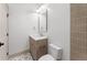 Updated bathroom featuring quartz countertops and designer tile shower at 80 Smith St, Charleston, SC 29401