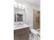 Updated bathroom featuring quartz countertops and designer tile shower at 80 Smith St, Charleston, SC 29401