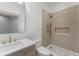 Updated bathroom featuring quartz countertops and designer tile shower at 80 Smith St, Charleston, SC 29401