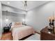 Inviting bedroom featuring patterned wallpaper, chic lighting, and a comfortable bed with side tables at 80 Smith St, Charleston, SC 29401