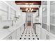 Modern galley kitchen featuring marble countertops, stainless steel appliances, and ample cabinet space at 80 Smith St, Charleston, SC 29401
