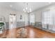 Bright living room with hardwood floors, modern chandelier, and an open floor plan at 80 Smith St, Charleston, SC 29401