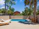 Inviting backyard with a pool, lounge chairs, and a custom wooden deck at 80 Smith St, Charleston, SC 29401