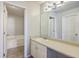 Clean bathroom featuring a vanity, sink, and a view into the bath/shower area at 8028 Vermont Rd, North Charleston, SC 29418