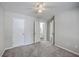 Bedroom boasts neutral paint, carpet, and multiple closets for ample storage at 8028 Vermont Rd, North Charleston, SC 29418