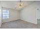 Inviting bedroom featuring a ceiling fan and bright window at 8028 Vermont Rd, North Charleston, SC 29418