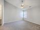 Well-lit bedroom with a neutral color scheme and a window at 8028 Vermont Rd, North Charleston, SC 29418