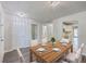 Dining room setup with a table, chairs, and views into other living spaces at 8028 Vermont Rd, North Charleston, SC 29418