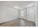 Bright entryway featuring hardwood floors and a stylish door with a large window at 8028 Vermont Rd, North Charleston, SC 29418