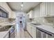 Modern kitchen featuring stainless steel appliances, sleek countertops, and an open layout at 8028 Vermont Rd, North Charleston, SC 29418