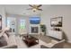 Bright and inviting living room featuring a cozy fireplace, modern furniture, and a stylish décor at 8028 Vermont Rd, North Charleston, SC 29418
