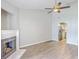 Cozy living room featuring a fireplace and seamlessly connecting to the modern kitchen at 8028 Vermont Rd, North Charleston, SC 29418