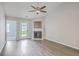 Cozy living room with a fireplace and hardwood floors at 8028 Vermont Rd, North Charleston, SC 29418