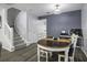 Bright dining area with modern flooring and plenty of natural light at 8096 Shadow Oak Dr Dr, North Charleston, SC 29406
