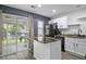 Well-lit kitchen with updated appliances and granite countertops at 8096 Shadow Oak Dr Dr, North Charleston, SC 29406