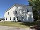 View of the rear exterior of the home showing siding and windows at 819 Burger St, Charleston, SC 29407