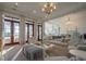 Spacious living room with hardwood floors, view of waterfront scenery, and neutral-toned decor at 821 Bulls Bay Blvd, Mount Pleasant, SC 29429