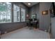 A dedicated workspace provides a quiet environment with a large window and ample desk space at 821 Bulls Bay Blvd, Mount Pleasant, SC 29429