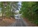Private boat ramp provides easy access to the river, surrounded by lush greenery at 8346 Chisolm Plantation Rd, Edisto Island, SC 29438