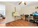 Bright home office featuring hardwood floors and a ceiling fan at 8346 Chisolm Plantation Rd, Edisto Island, SC 29438