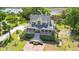 Aerial view of the charming house with a picturesque landscape and stunning water view at 8970 Palmetto Rd, Edisto Island, SC 29438