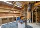 Finished basement with workshop area, providing a versatile space for hobbies and projects at 8970 Palmetto Rd, Edisto Island, SC 29438