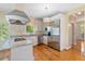 Kitchen featuring stainless appliances, granite countertops, and custom cabinetry at 8970 Palmetto Rd, Edisto Island, SC 29438