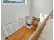 Bright living room, featuring hardwood floors, fireplace, and double french doors at 8970 Palmetto Rd, Edisto Island, SC 29438