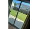 View of fenced backyard with grass and patio at 9217 Southern Oak Ln, Ladson, SC 29456
