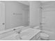 Bright bathroom featuring a tub-shower combo and a modern vanity at 9923 Honeylocust Ln, Ladson, SC 29456