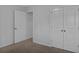Bedroom showing open doorway and closet at 9923 Honeylocust Ln, Ladson, SC 29456