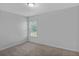 Cozy bedroom with neutral carpeting and a window providing natural light at 9923 Honeylocust Ln, Ladson, SC 29456
