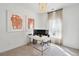 Bright home office with gold accented desk, chandelier lighting, and neutral walls at 1007 Swamp Rose Run, Summerville, SC 29485