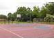 Community basketball court with fencing and surrounding trees at 1010 Fiall St, Charleston, SC 29407