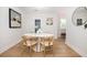 Bright dining room with a modern table, stylish chairs, and clean, minimalist decor for easy gatherings at 1010 Fiall St, Charleston, SC 29407