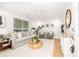 Spacious living room showcasing contemporary furnishings, ample natural light, and a welcoming open layout at 1010 Fiall St, Charleston, SC 29407