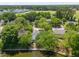 A high-angle view of the neighborhood featuring lush green spaces and mature trees, providing a serene living environment at 1027 Wayfarer Ln, Charleston, SC 29412