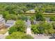 Aerial view of a home next to the community pool, and green spaces at 1027 Wayfarer Ln, Charleston, SC 29412