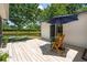 Charming back deck with outdoor seating and a beautiful lake view, great for enjoying nature at 1027 Wayfarer Ln, Charleston, SC 29412