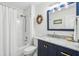 Bathroom showcasing a shower and a marble vanity with elegant finishes at 1027 Wayfarer Ln, Charleston, SC 29412