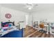 Bright and open bedroom with laminate flooring and lots of storage and study space at 1027 Wayfarer Ln, Charleston, SC 29412