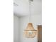 Close-up of a modern, beaded chandelier suspended from the ceiling at 1027 Wayfarer Ln, Charleston, SC 29412