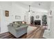 Spacious living room features hardwood floors, comfortable seating, and a classic piano at 1027 Wayfarer Ln, Charleston, SC 29412