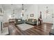 Bright living room featuring hardwood floors, ceiling fans, and comfortable seating at 1027 Wayfarer Ln, Charleston, SC 29412