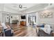 Spacious living room with hardwood floors and an open floorplan to the outside at 1027 Wayfarer Ln, Charleston, SC 29412