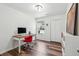 Well-lit office with modern desk, and large windows to let the light in at 1027 Wayfarer Ln, Charleston, SC 29412